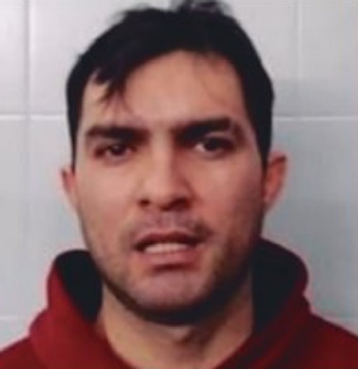 Cartel de recompensa por captura de Eduardo Rodolfo Muñoz por crimen de policía en Rosario