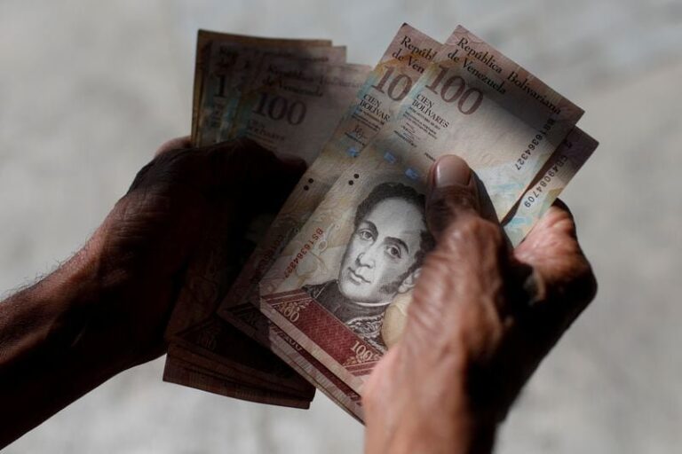 Bandera de Venezuela y gráficos financieros