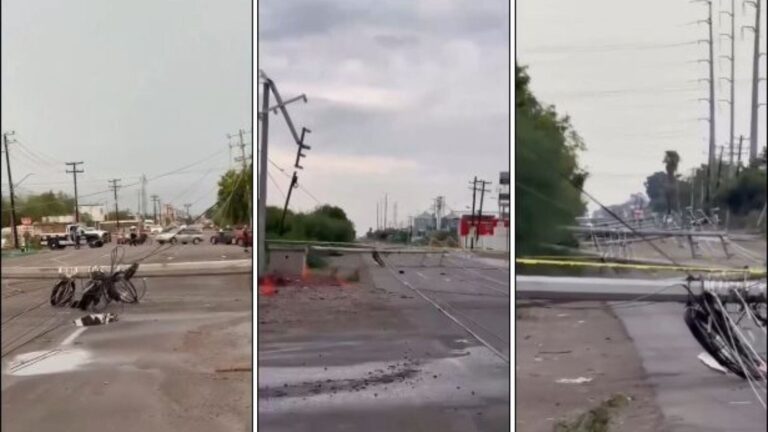 Postes y cables eléctricos caídos sobre pavimento mojado en Cajeme, Sonora